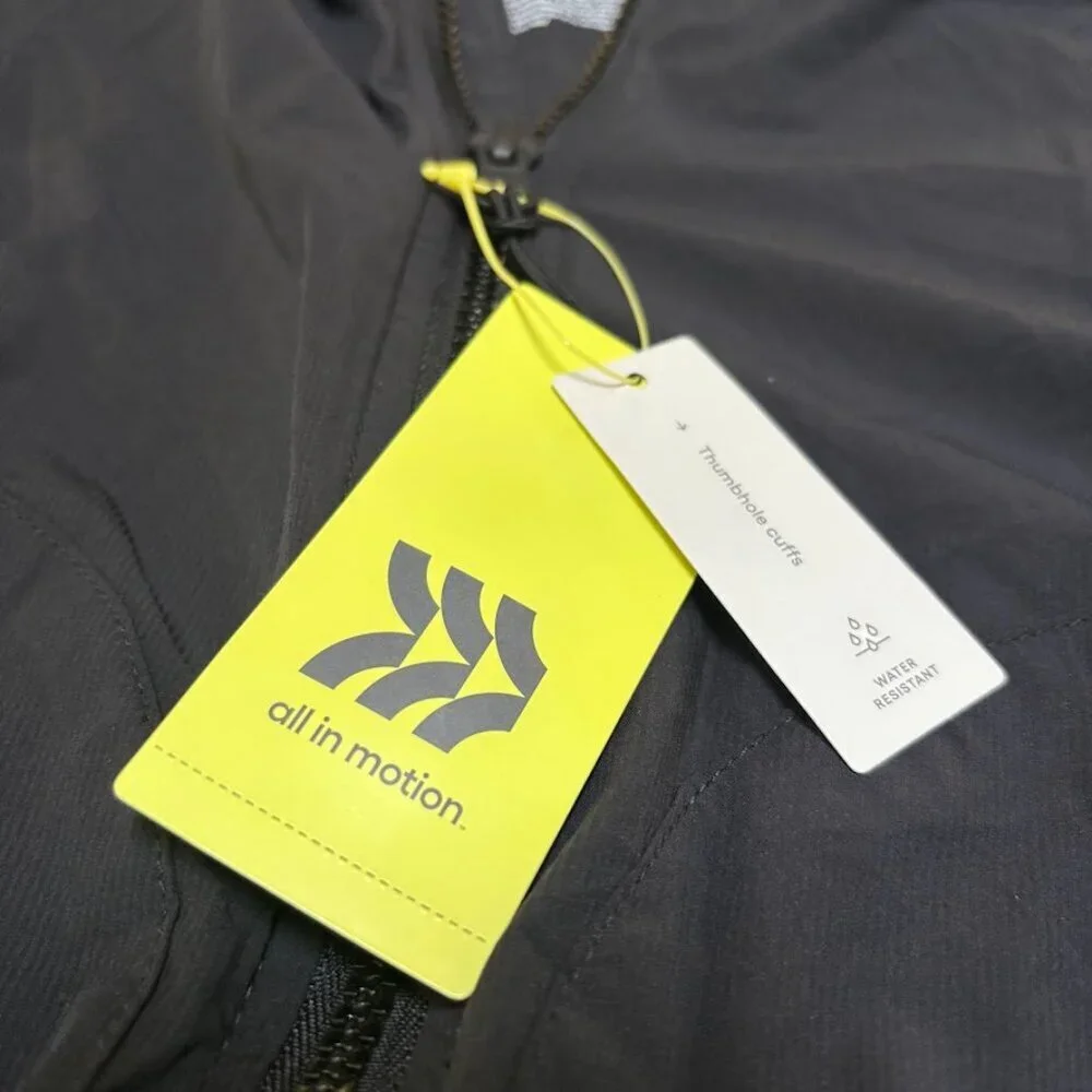 All in Motion Black, hooded, zip-up windbreaker jacket Youth